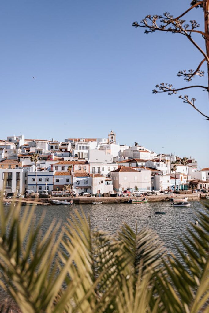 Explore the charming coastal village of Ferragudo in Portugal with its picturesque waterfront and traditional architecture.